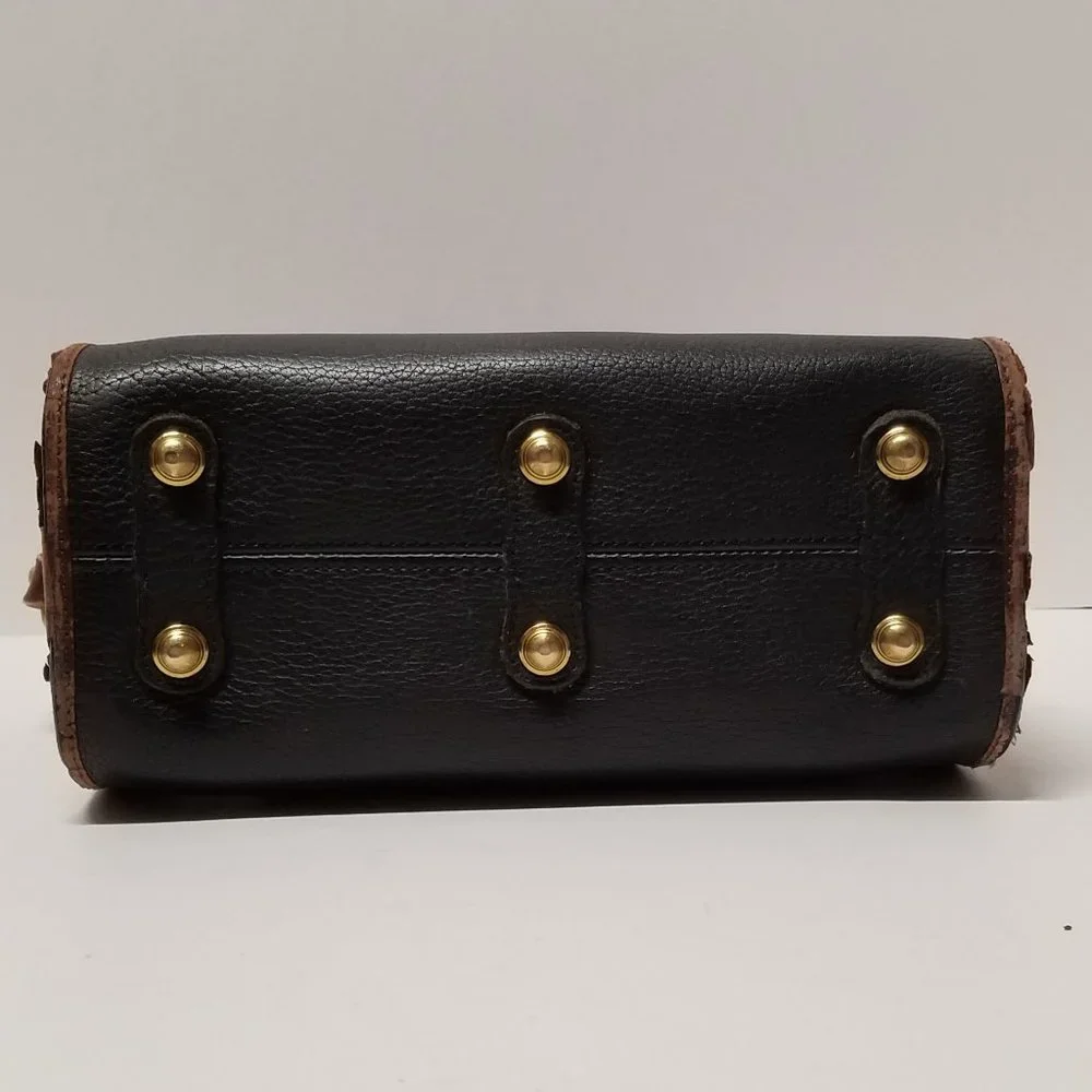 Dooney & Bourke production 1990